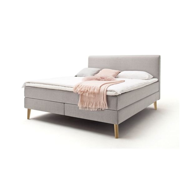 Svetlosivá čalúnená dvojlôžková posteľ s matracom Meise Möbel Greta, 160 x 200 cm