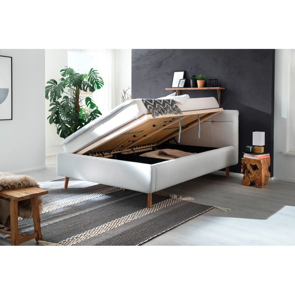 Svetlosivá čalúnená dvojlôžková posteľ s úložným priestorom s roštom 140x200 cm Lotte - Meise Möbel