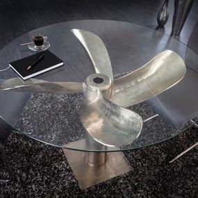 Estila Okrúhly jedálenský stôl z kovu a skla v tvare lodnej skrutky v striebornom prevedení s okrúhlou doskou zo skla 94cm