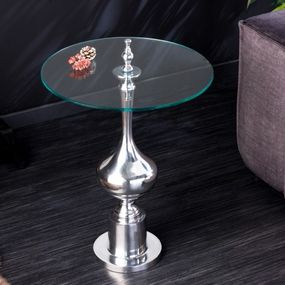 Estila Dizajnový príručný stolík Marietta s okrúhlou sklenenou vrchnou doskou a ozdobnou striebornou podstavou 65cm