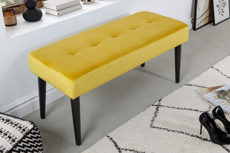 Estila Dizajnová moderná lavica Soreli obdĺžnikového tvaru so žltým čalúnením a čiernymi nohami z kovu 95cm