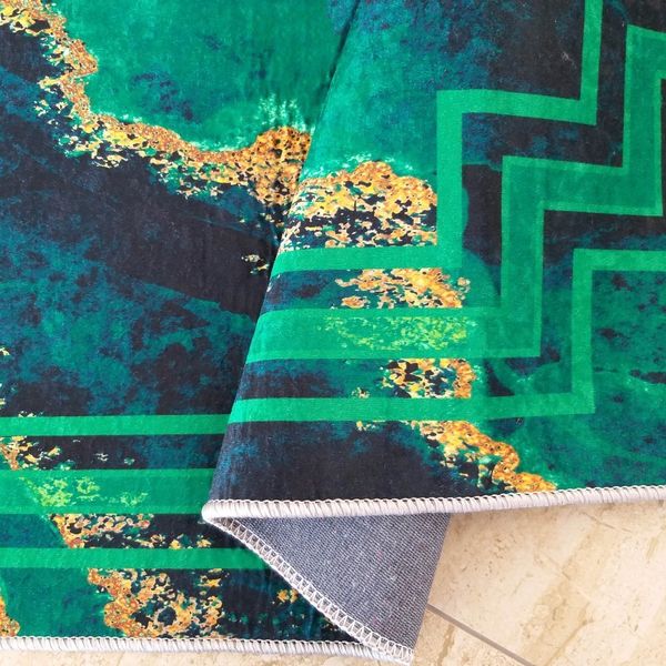 DomTextilu Protišmykový koberec zelenej farby so vzorom 55139-234500