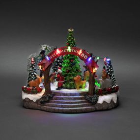 Konstsmide Christmas Stolová dekorácia Vianočné ZOO farebné diódy hudba, polyrezín, 0.06W, L: 28 cm, K: 20cm